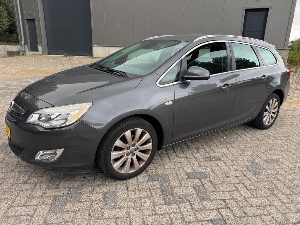 Opel Astra Sports Tourer 1.4 Cosmo Navi cruiseC Clima, Voorwielaandrijving, Euro 5, 101 pk, Gebruikt