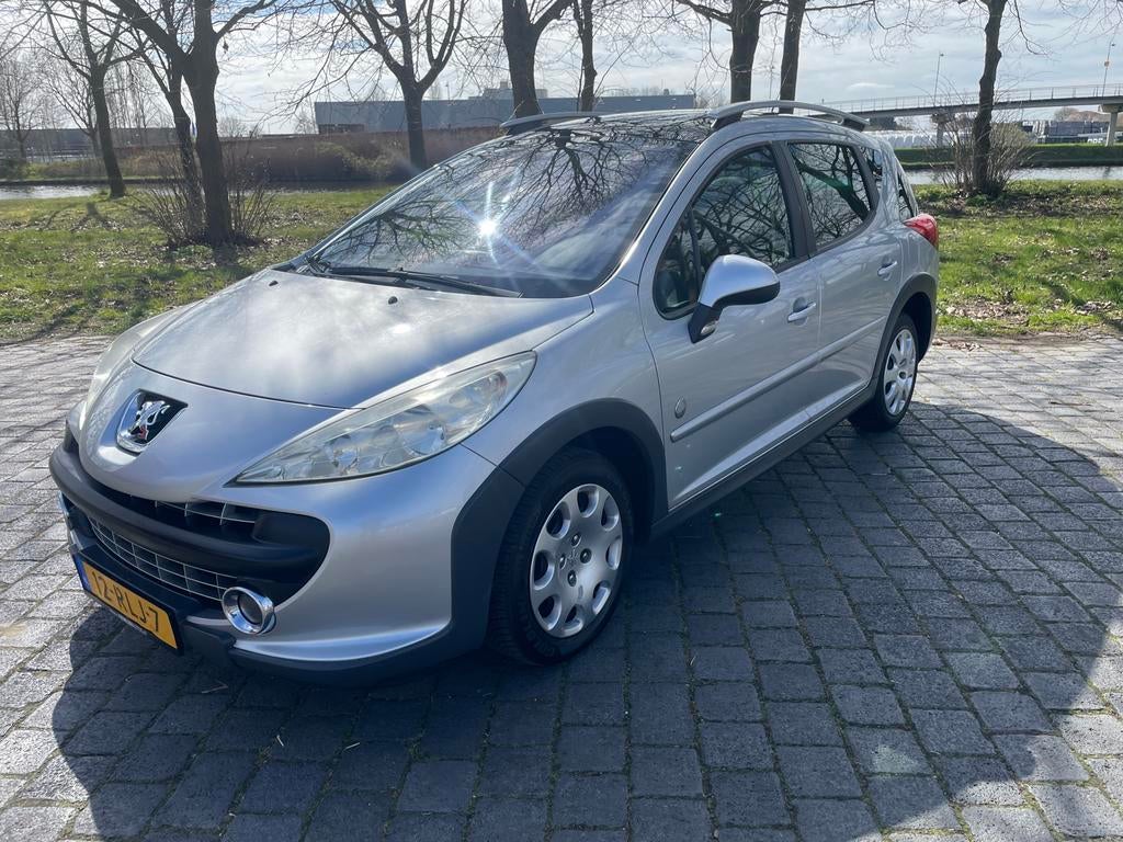 Peugeot 207 1.6 16V SW Outdoor 2008 Airco!, Zwart, 4 cilinders, Metallic lak, Leder en Stof