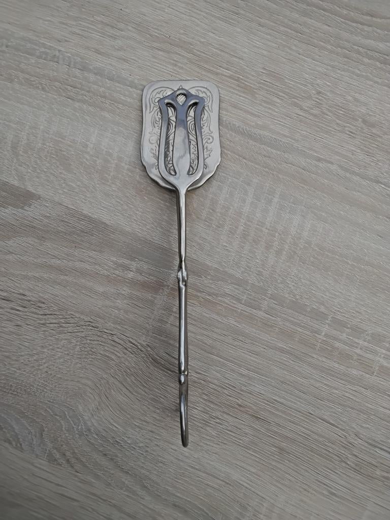 Antieke verzilverde suikertang met gravure, Ophalen