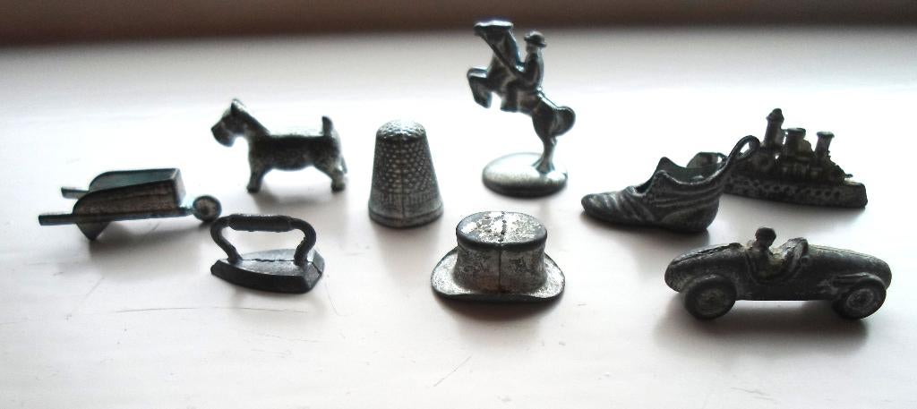9 Metalen Monopoly speelstukjes / pionnen., Ophalen of Verzenden, Zo goed als nieuw