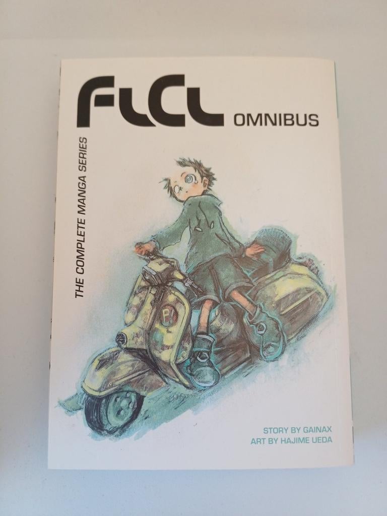 FLCL Omnibus - Manga, Boeken, Verzenden, Zo goed als nieuw