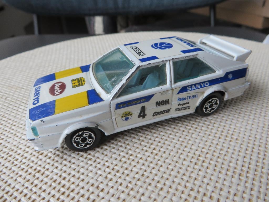 Burago Audi Quattro wit SANYO, Ophalen of Verzenden, Gebruikt, Auto, Overige merken