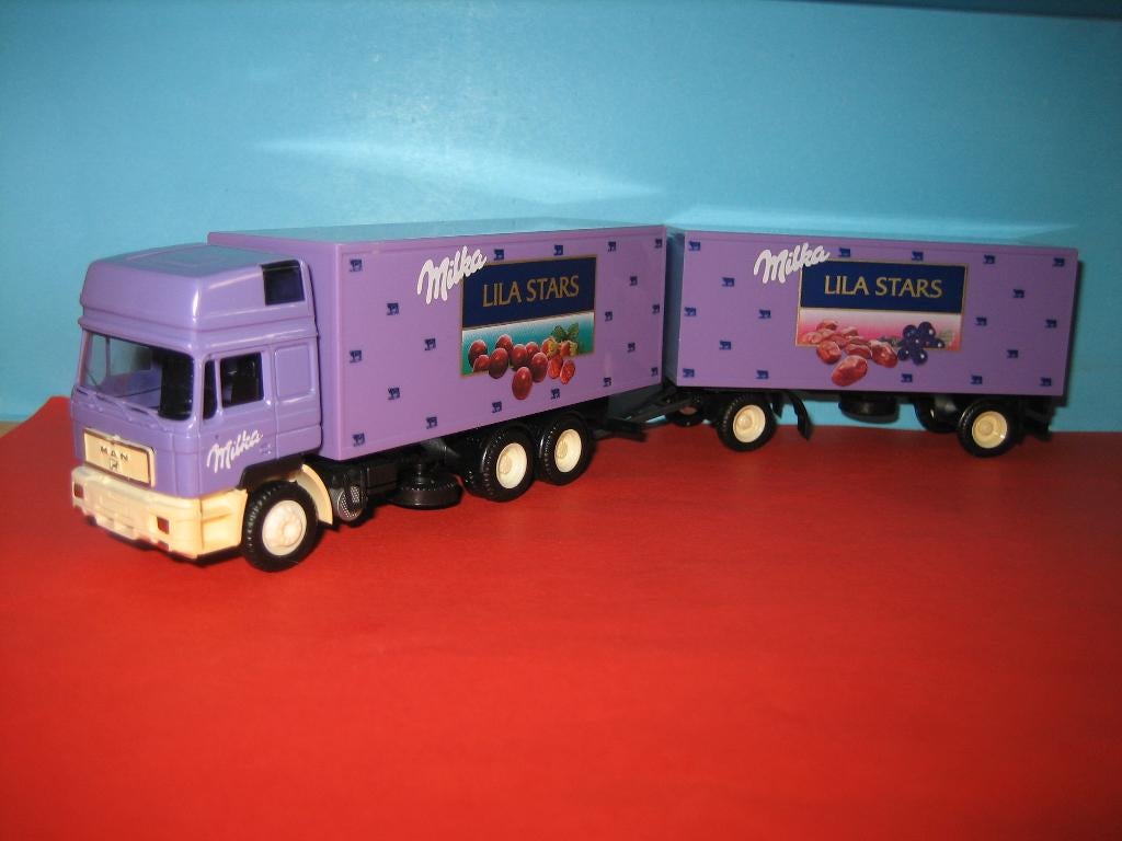 Milka  lila-star  MAN combi  AWM, Ophalen of Verzenden, Zo goed als nieuw, Bus of Vrachtwagen, AWM
