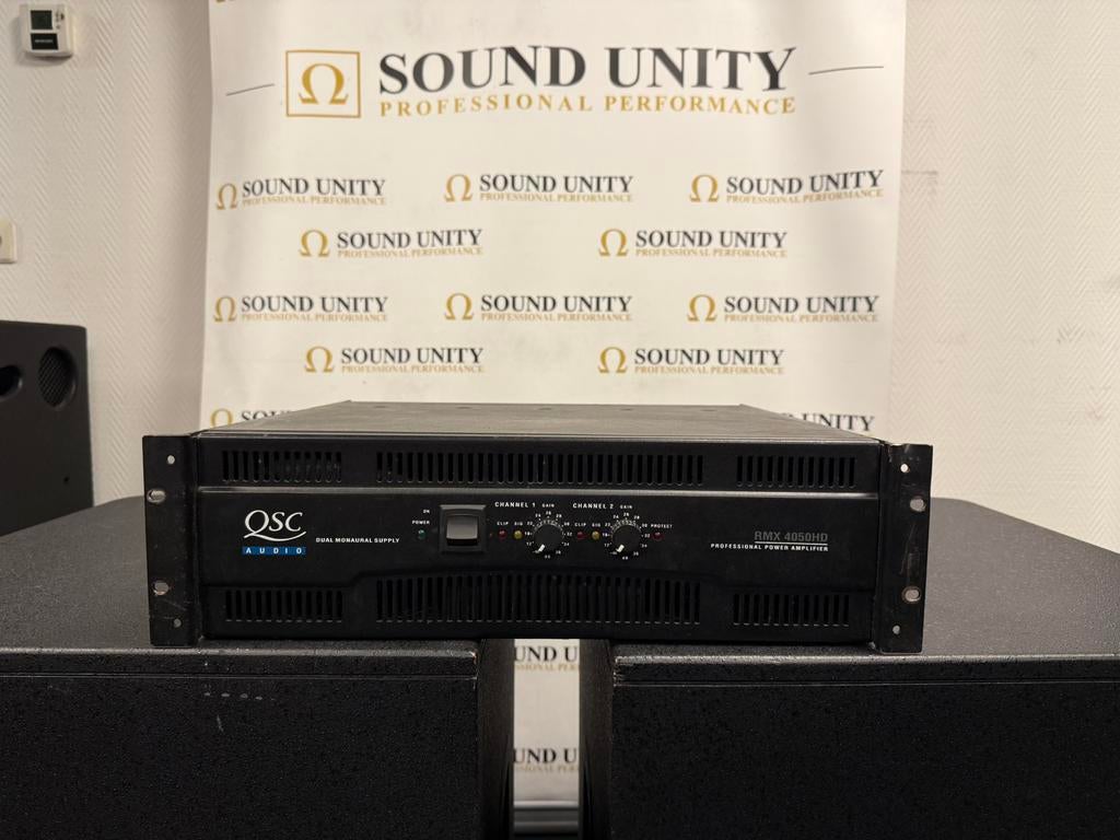 QSC RMX4050HD 2x1400W/4ohm (TANK), Audio, Tv en Foto, Subwoofer, Zo goed als nieuw, 120 watt of meer, Ophalen