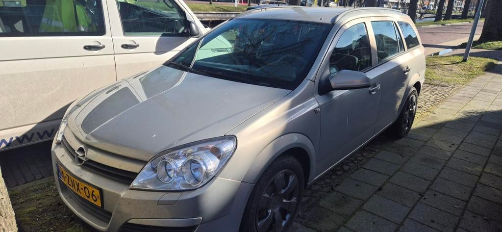 Opel Astra 1.6 16V St.wgn. 2005 Grijs, Auto's, Voorwielaandrijving, 15 km/l, 4 cilinders, Stationwagon