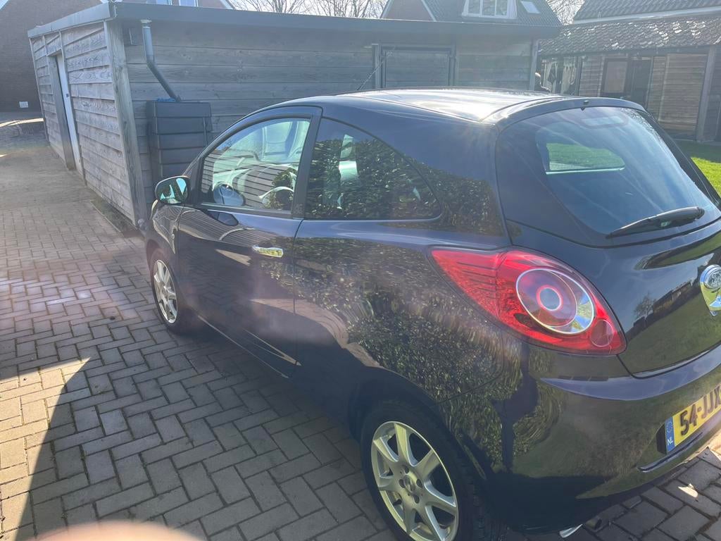 Ford Ka 1.2 51KW 2009 Zwart, Auto's, Voorwielaandrijving, Stof, 1242 cc, 4 cilinders