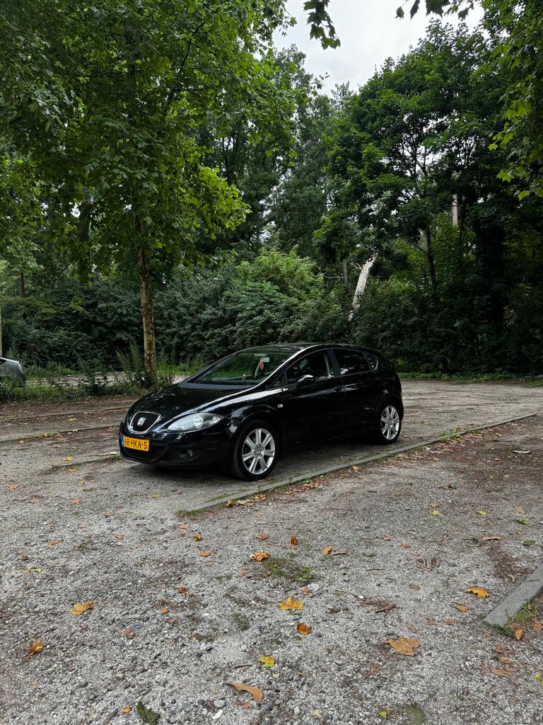 Seat Leon 1.6 75KW 2009 Zwart, Auto's, 4 cilinders, Leon, Zwart, 1200 kg