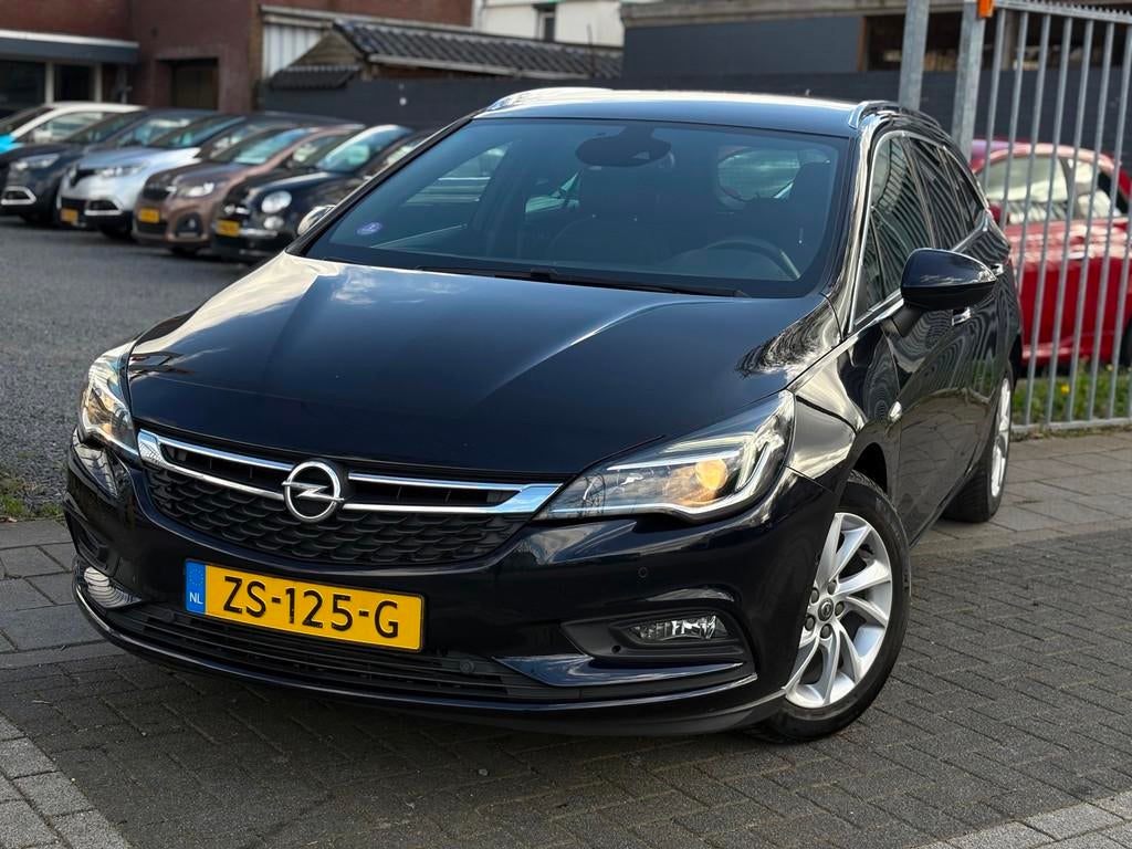 Opel Astra Sports Tourer 1.0 Turbo Business Executive | Trek, Gebruikt, 1178 kg, Blauw, Origineel Nederlands