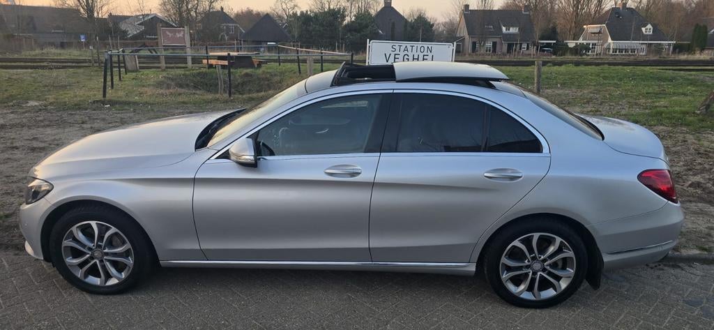Mercedes C350e plug in hybride Alle opties NAP, Auto's, Automaat, Zwart, 4 cilinders, Leder