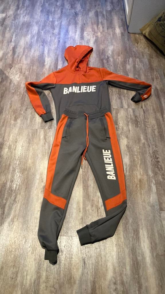 Oranje met grijs banlieue trainingspak, Ophalen of Verzenden, Zo goed als nieuw, Maat 46 (S) of kleiner