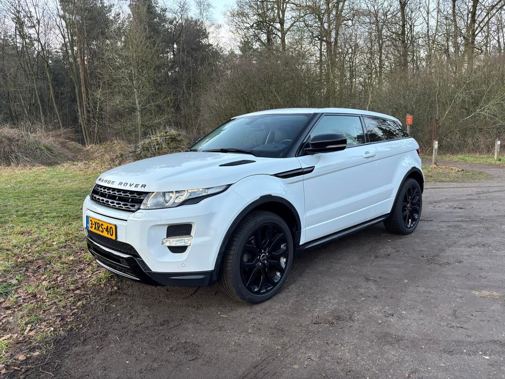 Range Rover Evoque Coupé Si4 Dynamic Automaat, Auto's, Land Rover, Automaat, 1800 kg, 4 cilinders, Wit