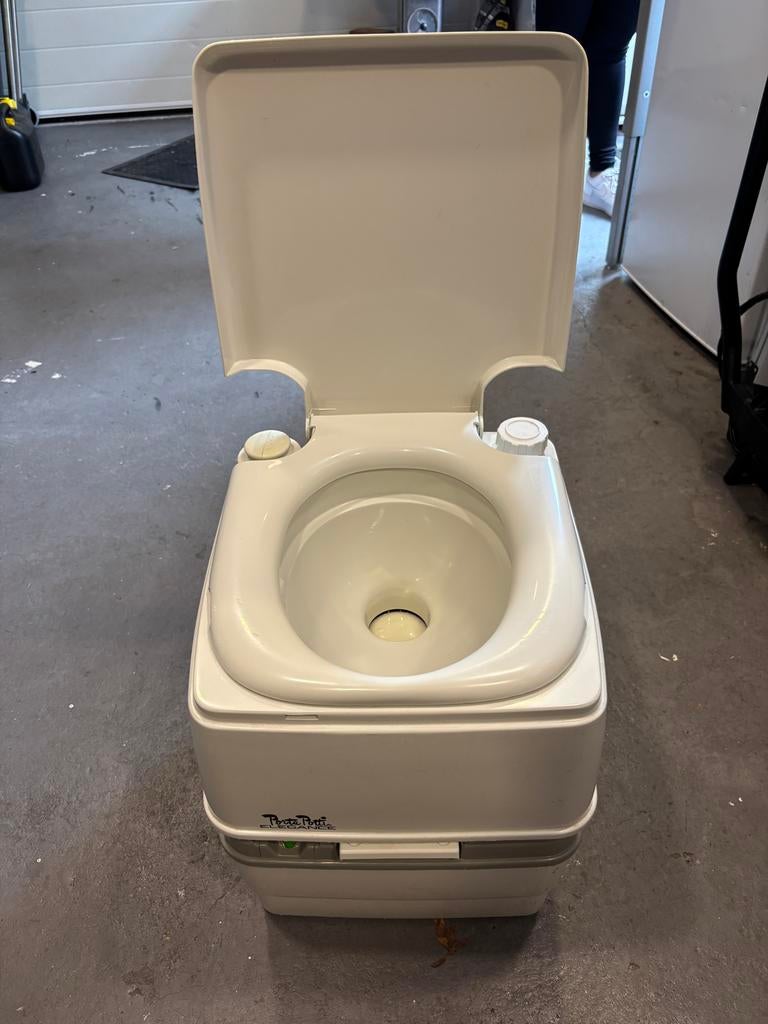 Porta Potti met spoelmiddel, Ophalen, Gebruikt