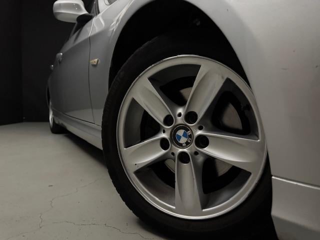 BMW 3 Serie 318i Business Line *AUTOMAAT*NAVI (bj 2009), Automaat, Euro 5, Achterwielaandrijving, Sedan