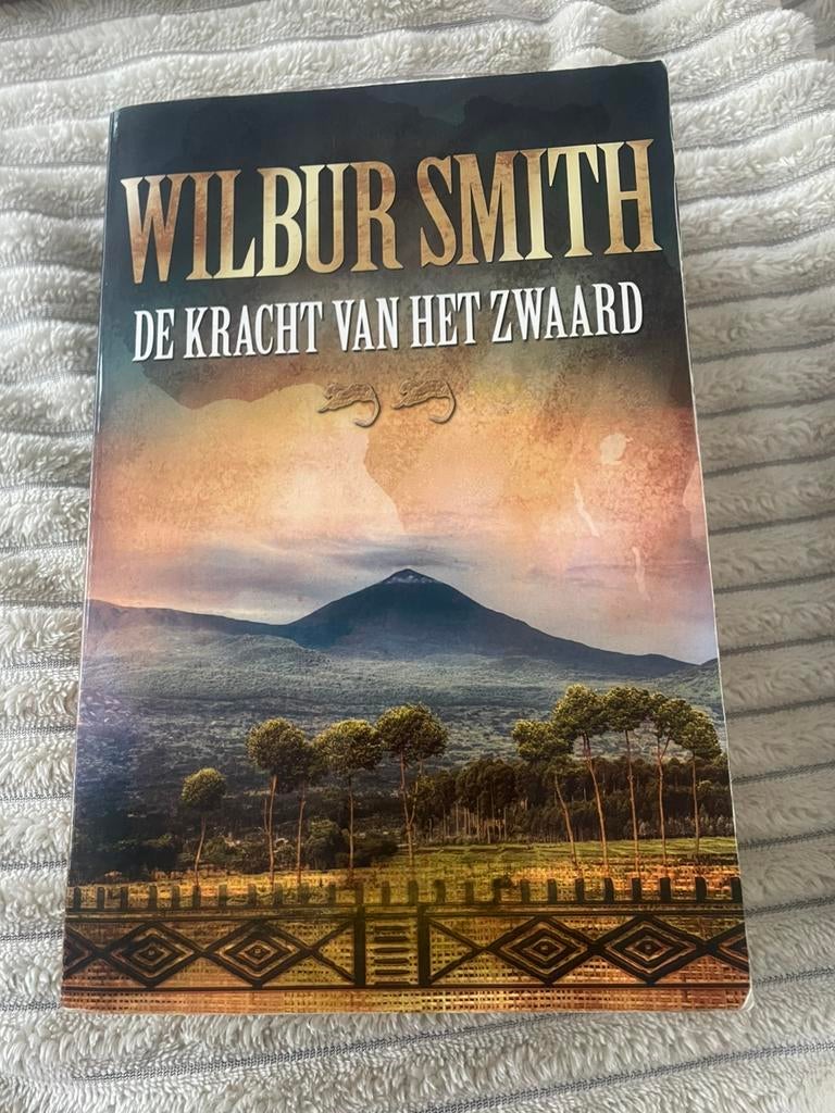 Wilbur Smith - De Kracht van het Zwaard (Courtney deel 2), Boeken, Ophalen of Verzenden, Gelezen, Nederland