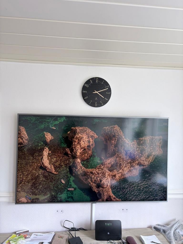 Samsung 65 inch TV, Ophalen