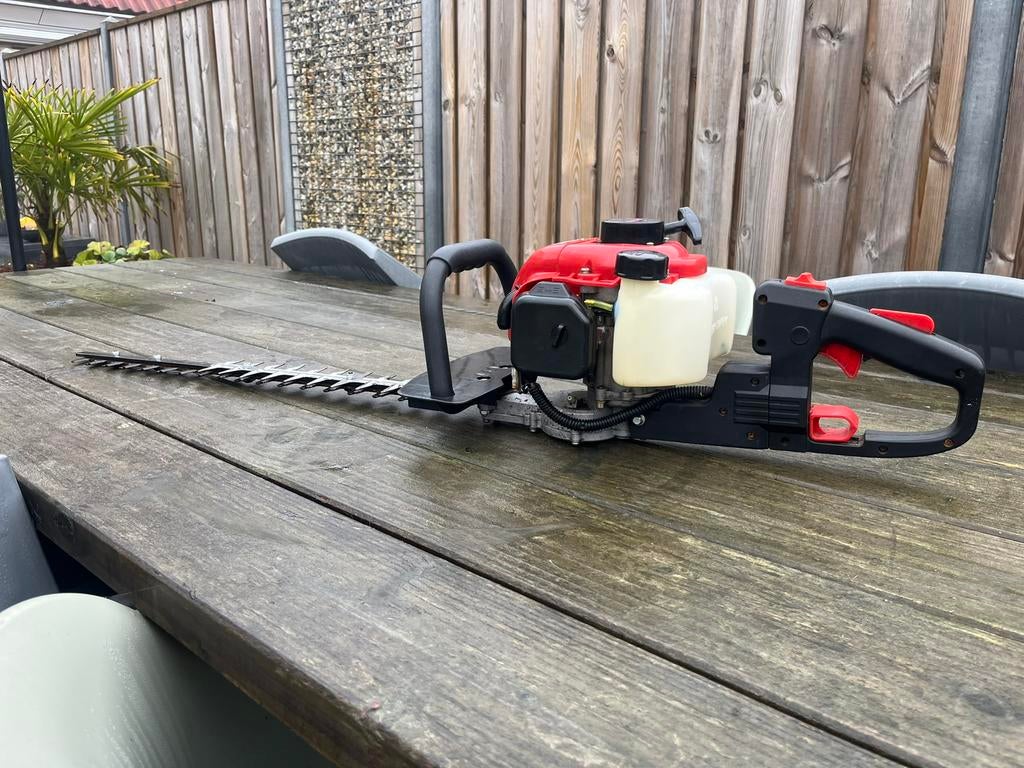 Ikra heggenschaar NU 99 euro, Tuin en Terras, Heggenscharen, Ophalen, Zo goed als nieuw, Benzine