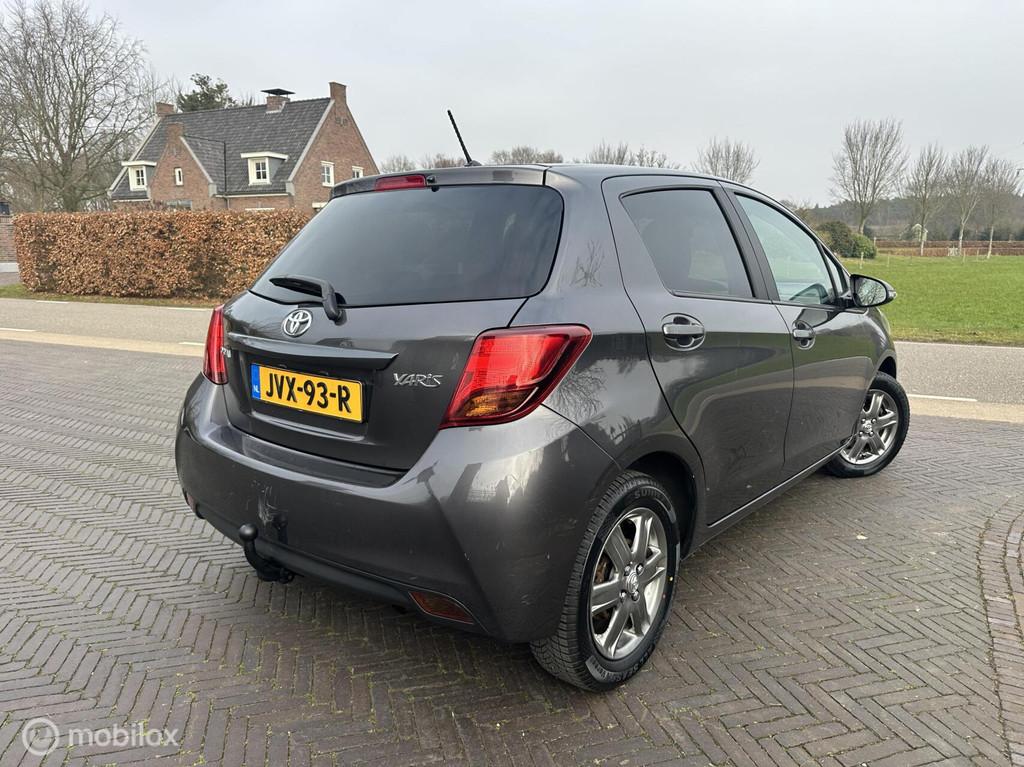 ✅Toyota Yaris 1.0 VVT-i Business Plus Trekhaak Navi, Voorwielaandrijving, Stof, Gebruikt, Zwart