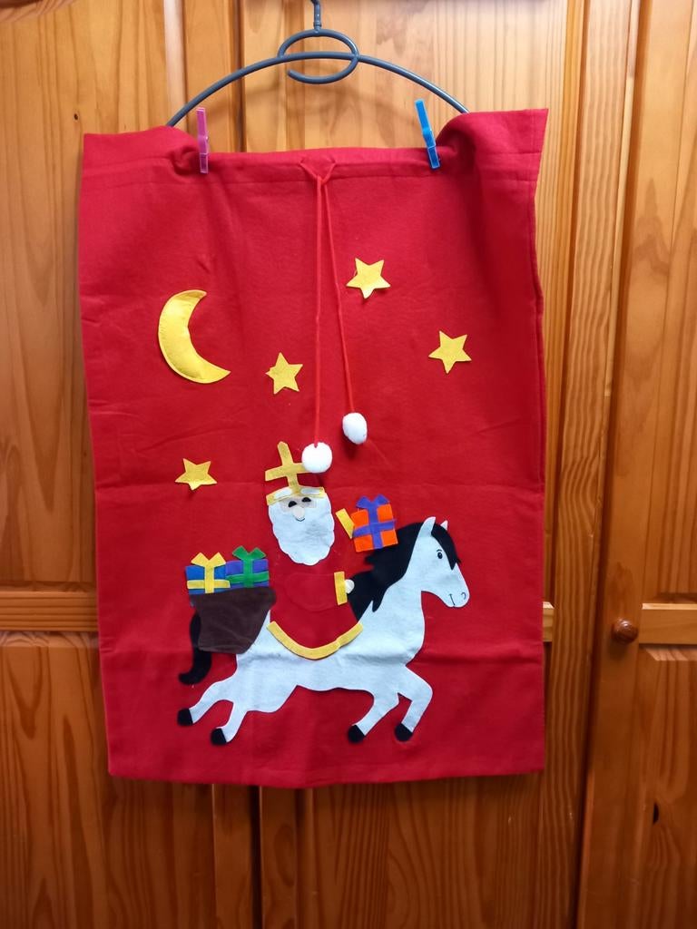 Sinterklaas zak, Ophalen