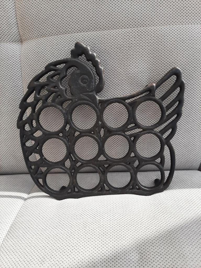 Gietijzeren eierhouder, Ophalen