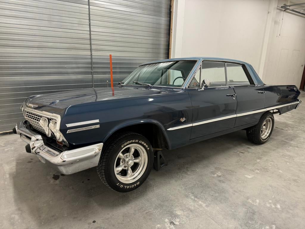 Te Koop Chevrolet Impala 1963 – Klassieker in Topstaat, Auto's, Automaat, Achterwielaandrijving, Blauw, Leder en Stof
