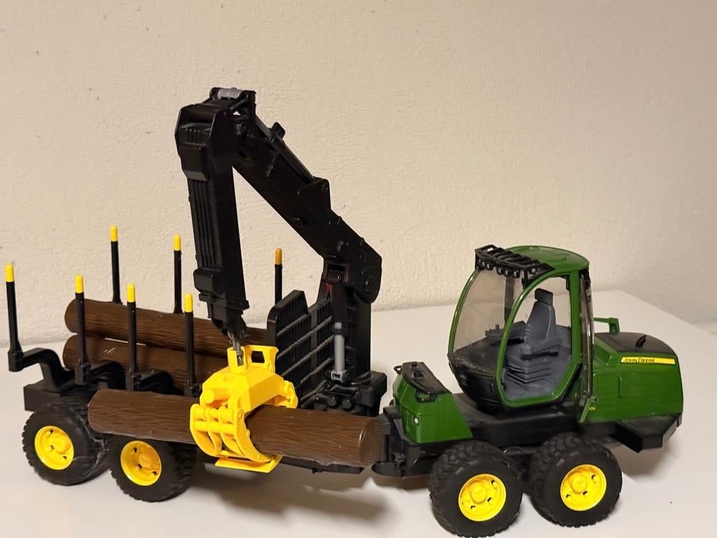 Bruder tractor met boomstamgrijper, Ophalen of Verzenden, Zo goed als nieuw