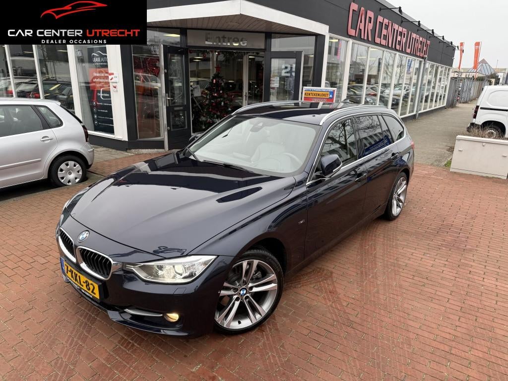 BMW 3 Serie Touring 328i | €250,- KORTING PAASACTIE | xDri, Automaat, 4 cilinders, Blauw, 93 €/maand