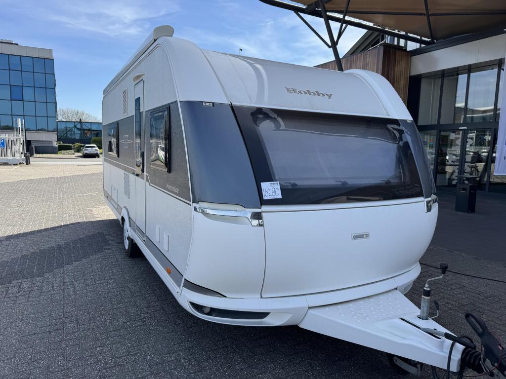 Hobby Prestige 560 WFU 2018 Mover,Airco,Luifel!!, Caravans en Kamperen, Caravans, Standaardzit, Bedrijf, 5 tot 6 meter, Schokbreker
