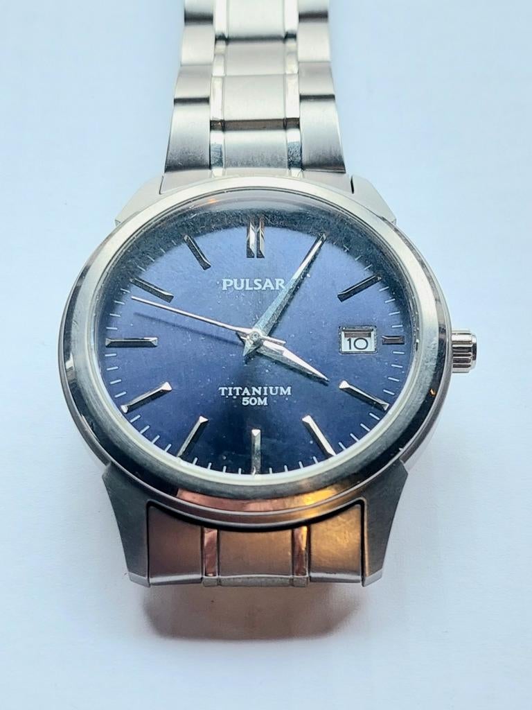 Herenhorloge Pulsar Titanium, Ophalen of Verzenden, Staal, Overige merken, 1960 of later