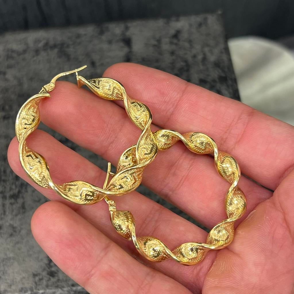 14 karaat gouden oorbellen wokkels oorbellen versace, Ophalen of Verzenden, Zo goed als nieuw, Goud