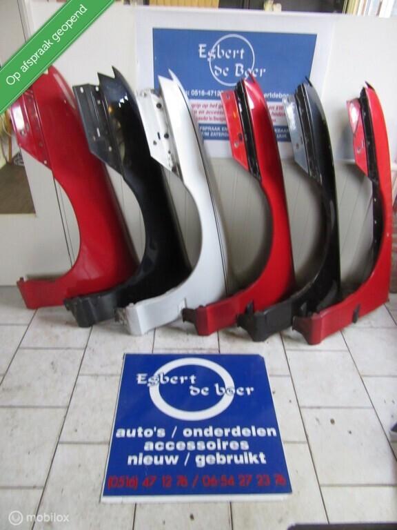 Spatbord voorscherm L+R Opel Calibra, bj '90 -'97, Gebruikt, Opel, Ophalen of Verzenden, Opel