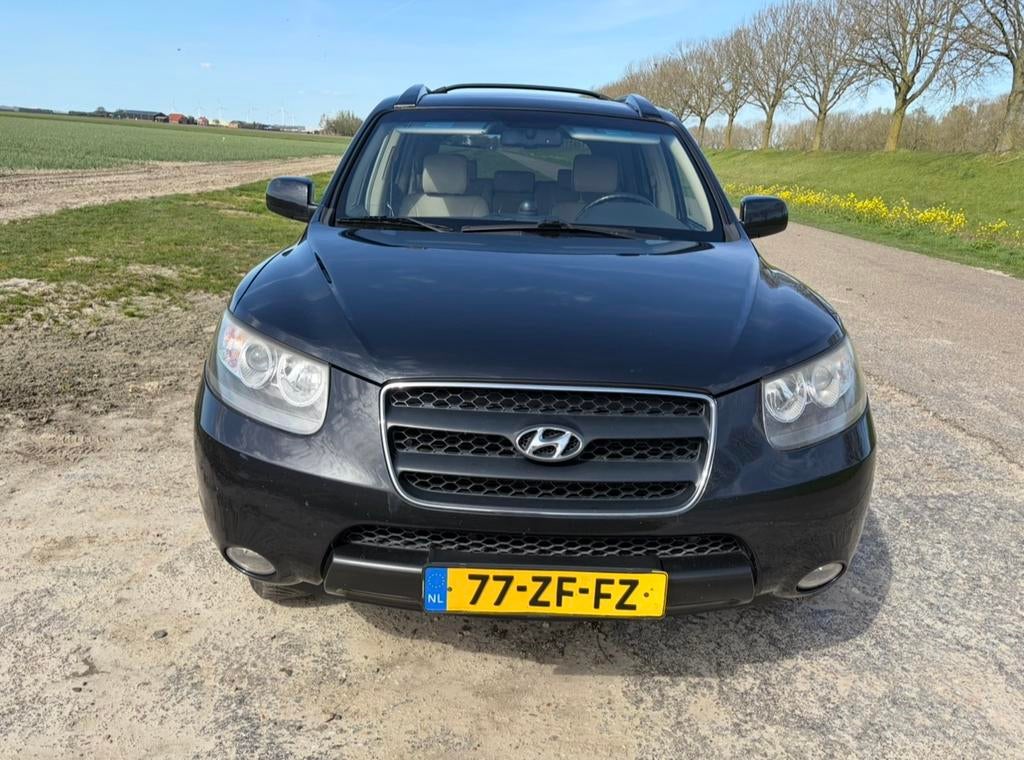 Hyundai Santa Fe 2.7 4WD style AUT 2008 Zwart, Auto's, Hyundai, Automaat, Santa Fe, Beige, 2000 kg
