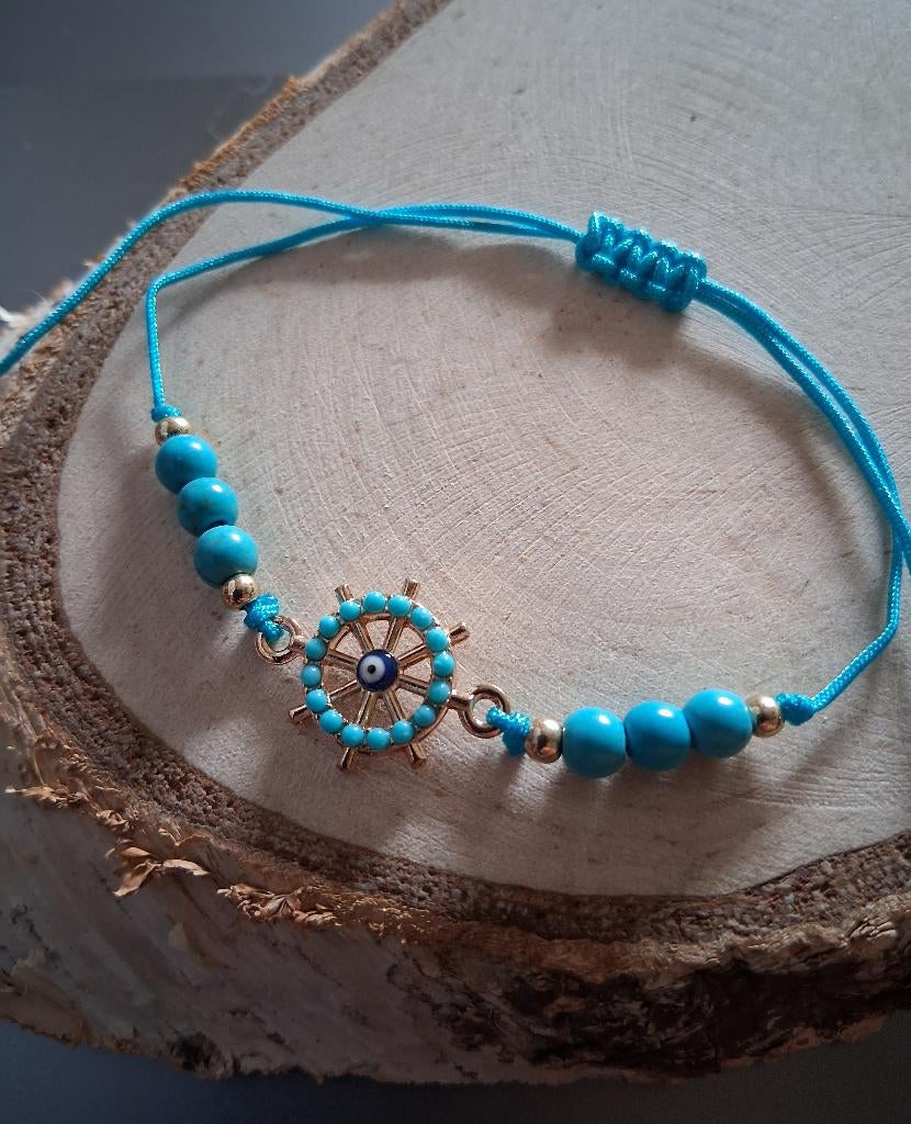 geluks armbandje stuurwiel nazar turquoise kraaltjes, Ophalen of Verzenden, Nieuw, Blauw, Overige materialen