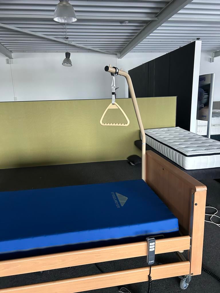 Elektrische hoog laag bed, Ophalen