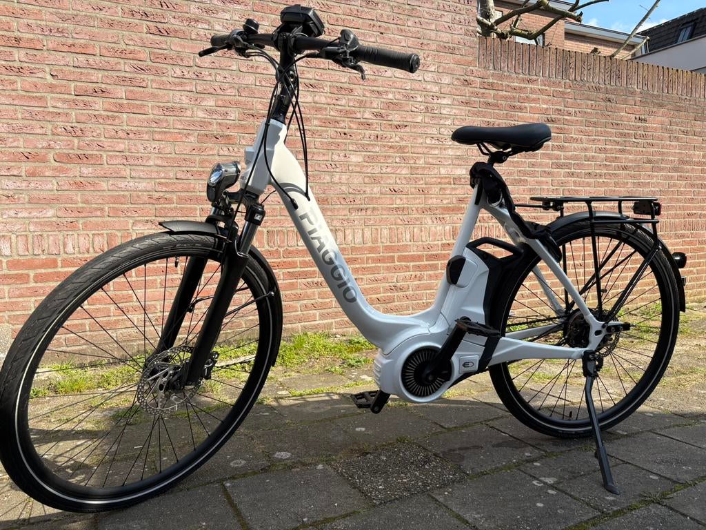 Piaggio elektrische fiets - Goede staat, Zo goed als nieuw, 51 tot 55 cm, 50 km per accu of meer, Ophalen