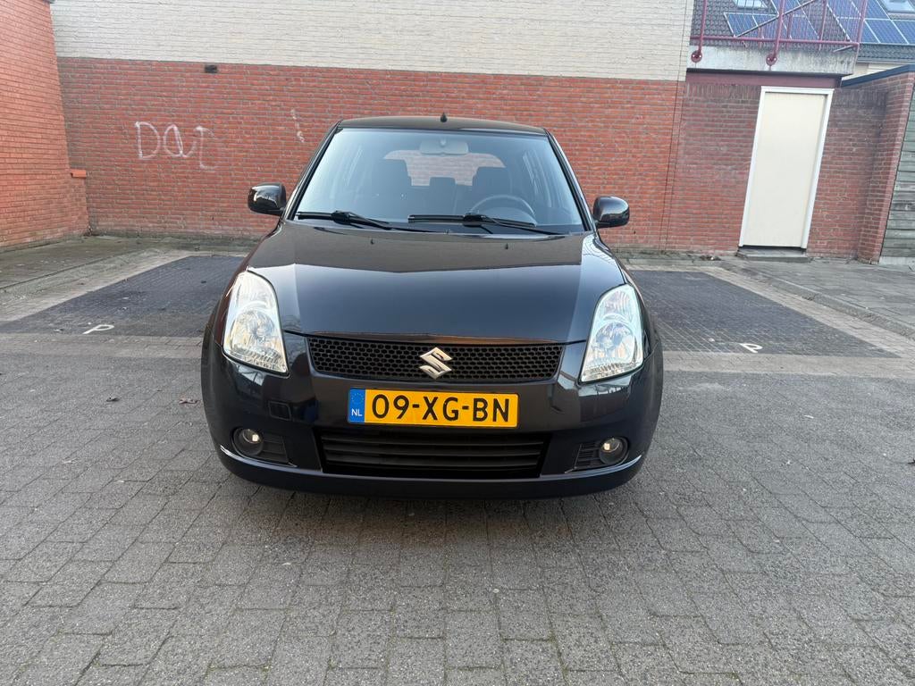 Suzuki Swift 1.3 5D 2007 Zwart Luxe Uitvoering… Veel Opties, Auto's, Suzuki, Voorwielaandrijving, Stof, 40 €/maand, 965 kg