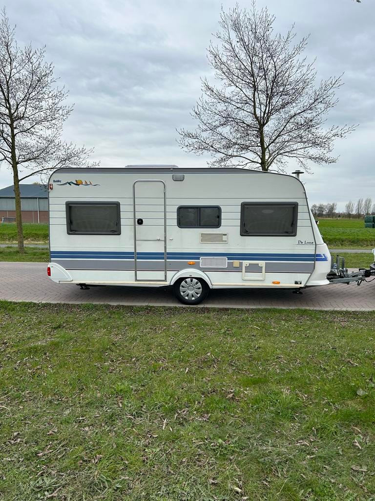 Caravan Hobby De Luxe 450 UF /voortent/luifel/fietsendrager, Vast bed, Hobby, Particulier, 4 tot 5 meter