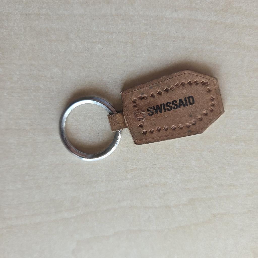 Swissaid Sleutelhanger, Verzamelen, Sleutelhangers, Gebruikt, Niet vindbaar, Niet vindbaar, Niet vindbaar