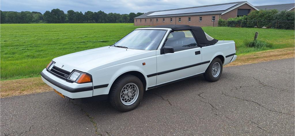 Toyota Celica 1.6 ST CABRIOLET BELASTING VRIJ (bj 1983), Auto's, Oldtimers, Zwart, Cabriolet, Open dak, Wit