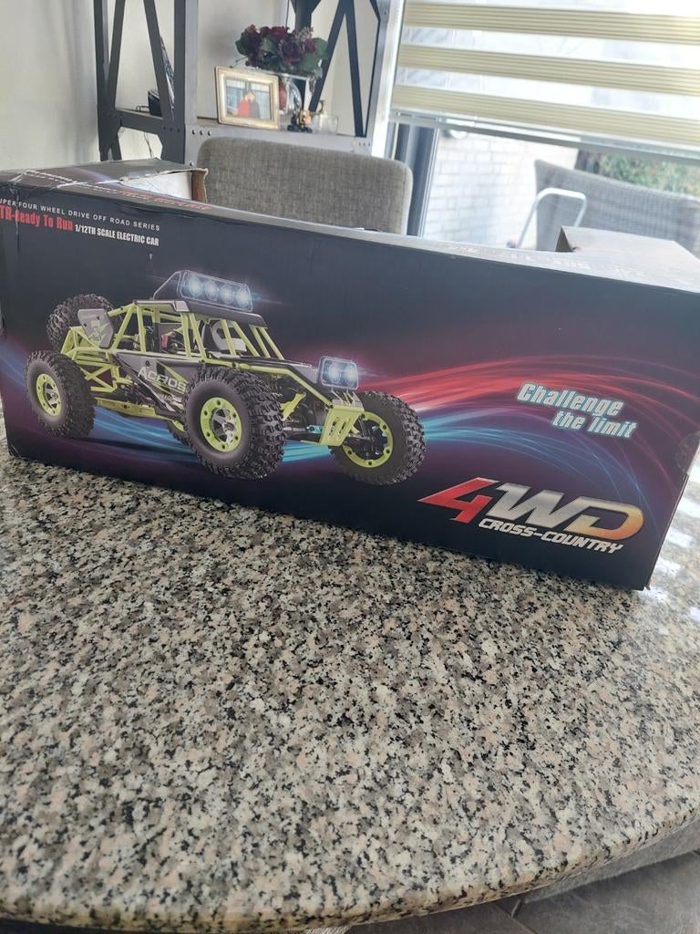 WL TOYS 12427 CROSS COUNTRY 50 KM/H 4WD HOGE SNELHEID 1:12 ., Elektro, Gebruikt, Auto offroad, Ophalen of Verzenden