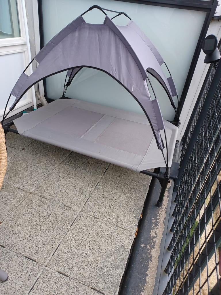 Hondenzonnebed met zonnescherm, Ophalen