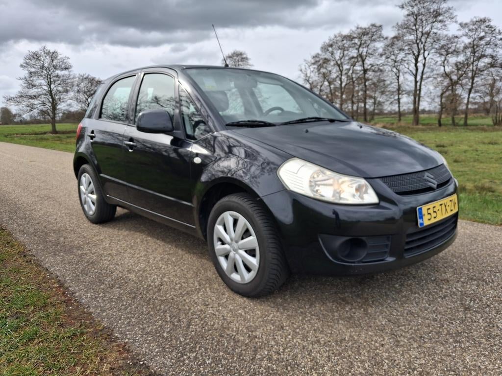 Suzuki SX4 1.6 2007 nieuwe apk trekhaak airco, Auto's, Voorwielaandrijving, 4 cilinders, Origineel Nederlands, 1200 kg