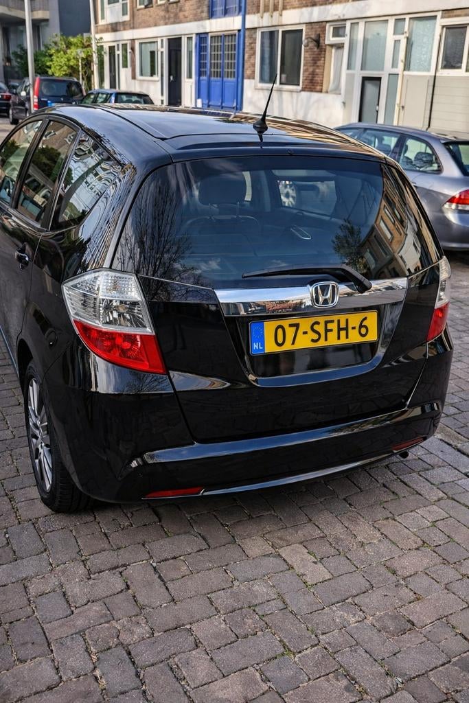 Honda Jazz 1.4 I-vtec 102pk CVT 2011 Zwart, Auto's, 4 cilinders, Parkeersensor, Origineel Nederlands, Grijs