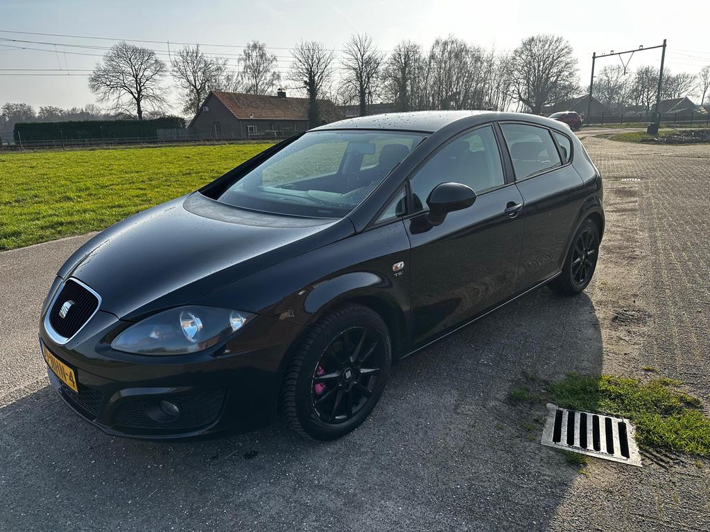 Seat Leon 1.2 TSI 77KW 2010 Zwart, Auto's, Seat, Voorwielaandrijving, Metallic lak, Stof, Zwart