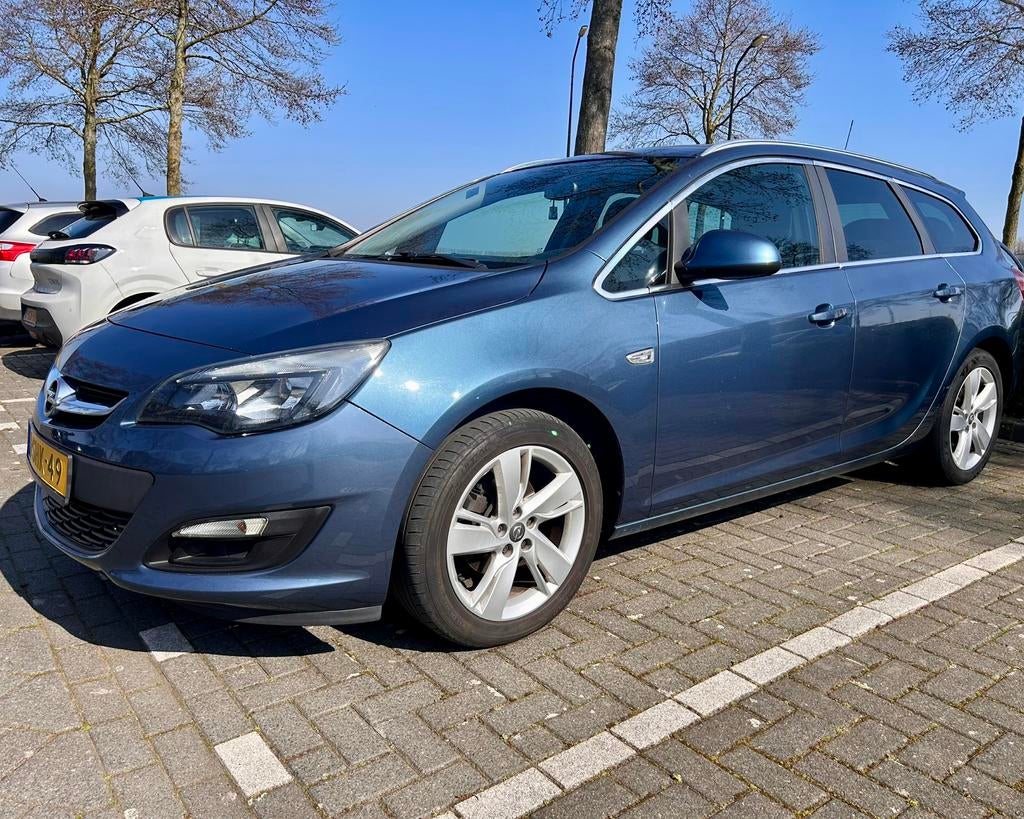 Opel Astra sports tourer 1.4 Turbo 2013 120pk Blauw, Auto's, Voorwielaandrijving, 4 cilinders, Blauw, Origineel Nederlands