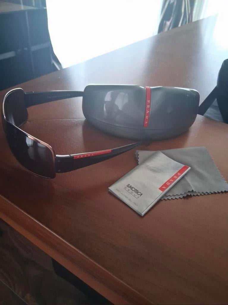 Prada heren zonnebril, Ophalen of Verzenden, Zo goed als nieuw, Bruin, Overige merken