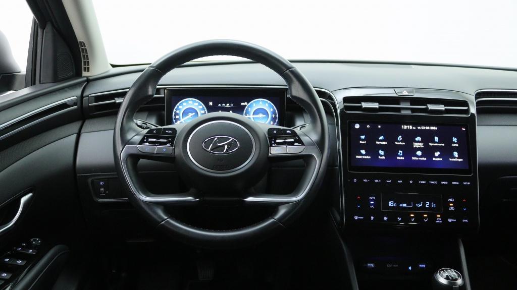 Hyundai Tucson 1.6 T-GDI MHEV Comfort | Navigatie | Stoelver, Keurmerk '100% Onderhouden', 12 maanden, Stof, Gebruikt