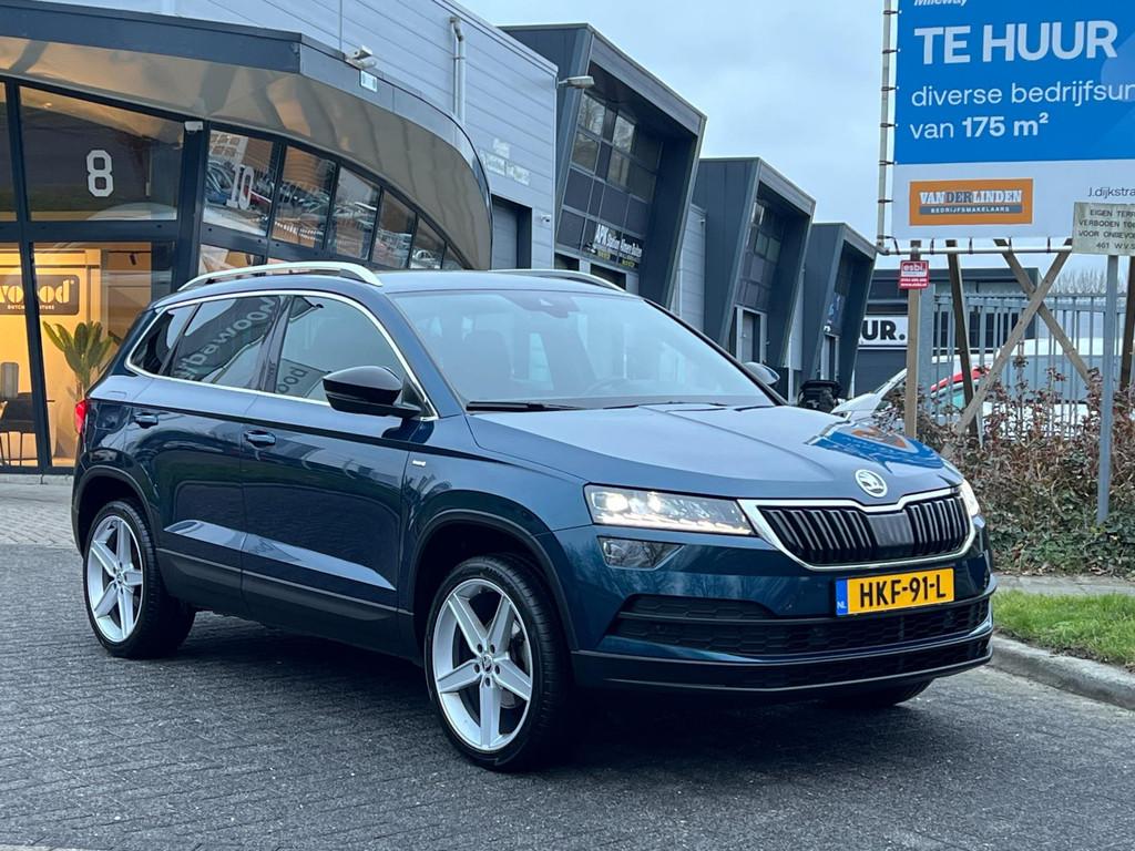 Skoda KAROQ 1.5 TSI ACT DSG-7 125 YEARS EDITION LED NAVI!, Stof, 4 cilinders, 150 pk, Blauw