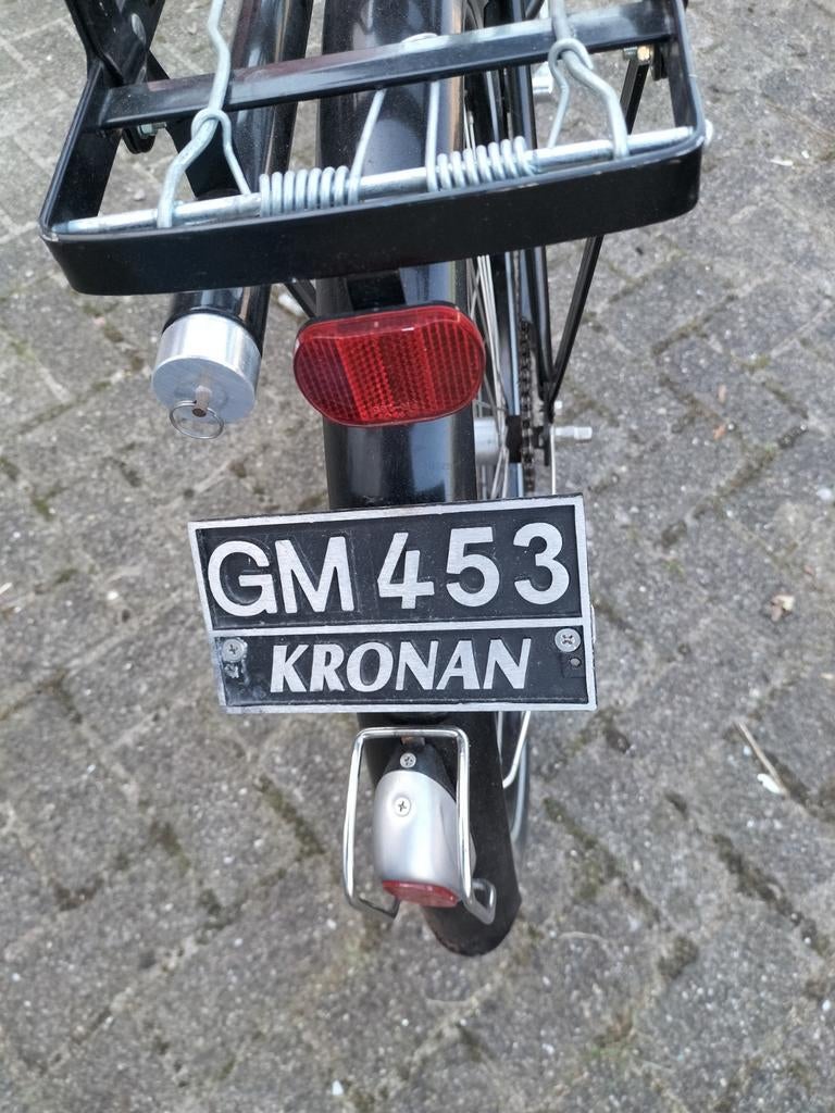 Kronan herenfiets., Ophalen