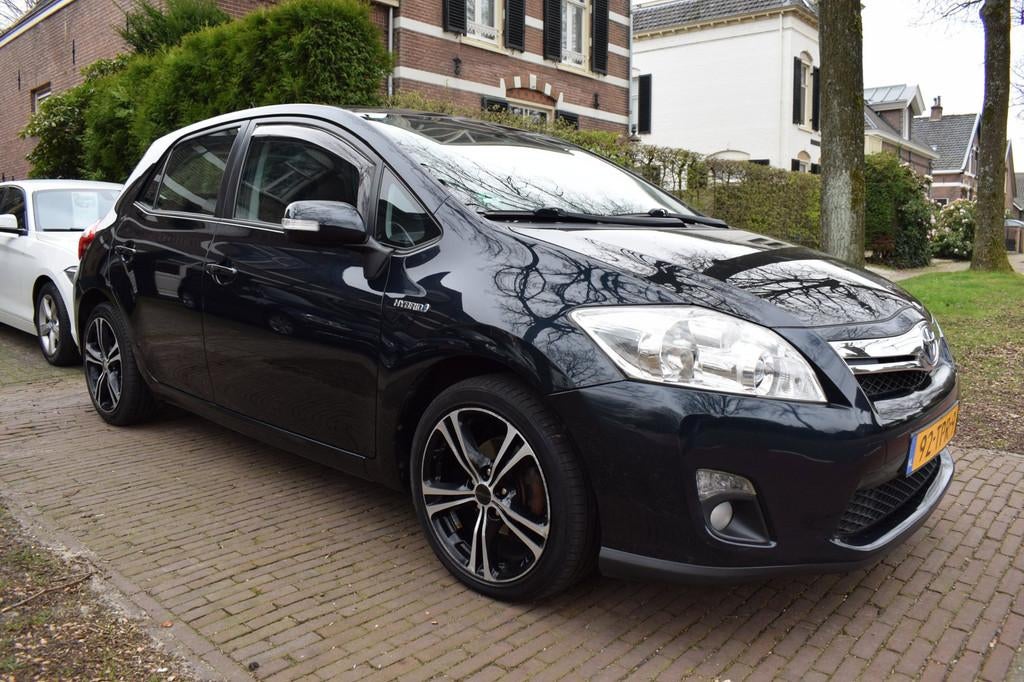 Toyota Auris 1.8 Full Hybrid Dynamic Business Navi/Cruise, Euro 5, Stof, Gebruikt, Zwart