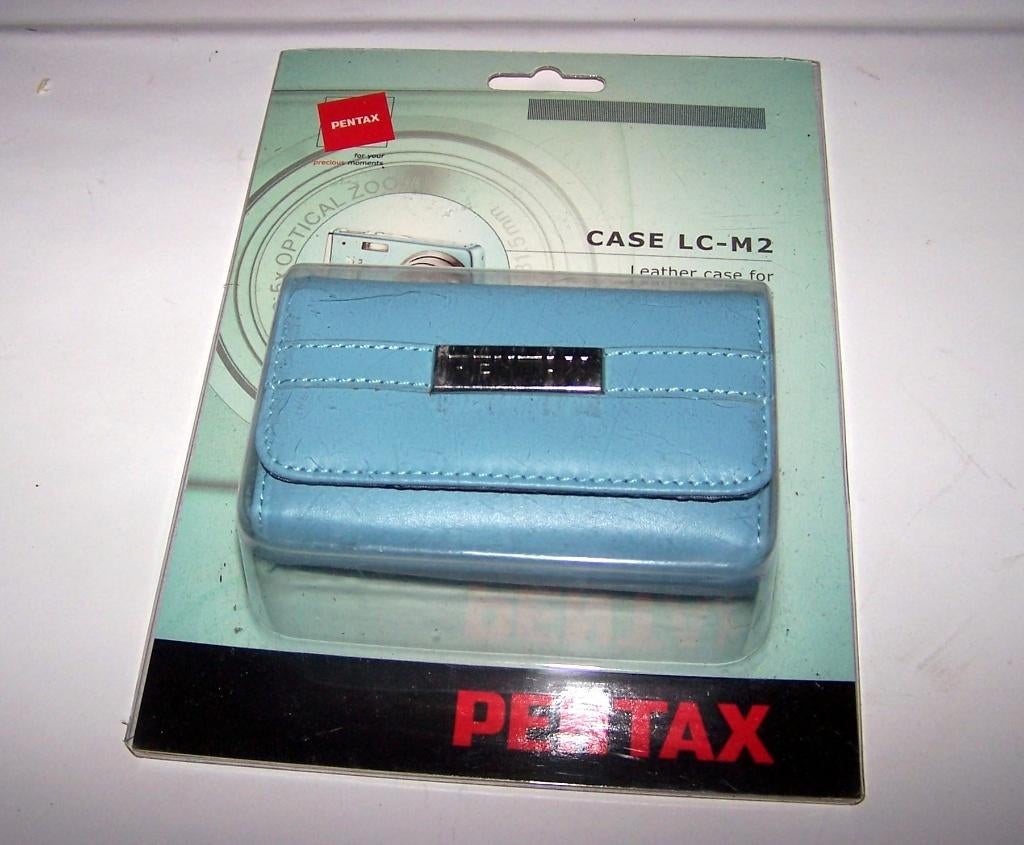 Prachtig leren lichtblauw Pentax cameratasje. Nieuw/ovp., Ophalen of Verzenden, Nieuw, Heuptas, Overige merken